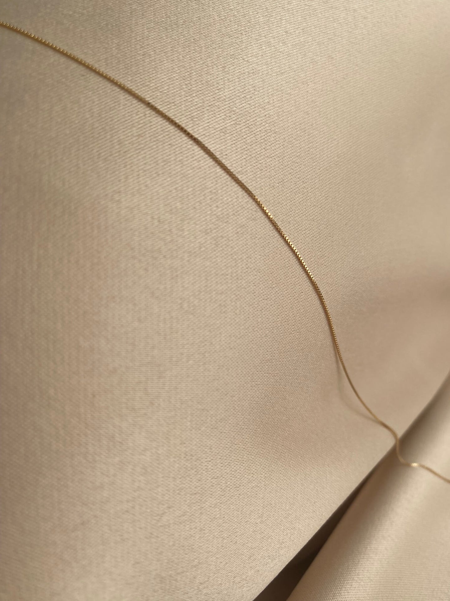 This is a 14k gold dainty box chain that is made of 14k solid gold.