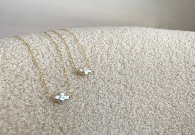 They are pearl cross necklace that are made of genuine Cross Pearl with 14k gold filled chains