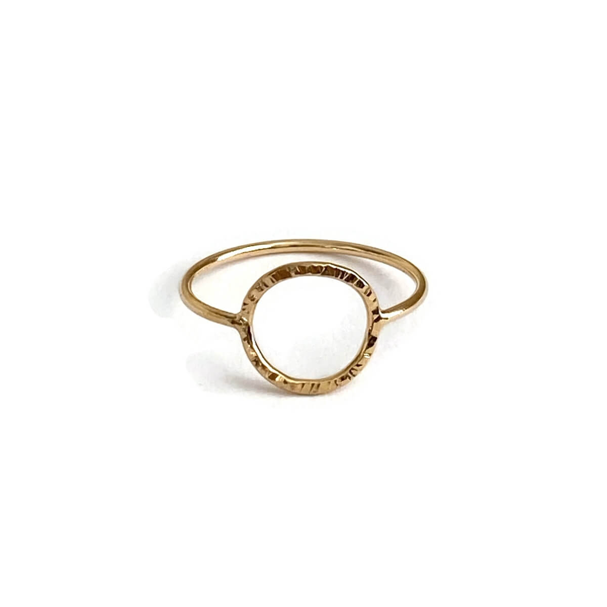 This is a gold filled ring with a circle that has hammered texture. It's dainty and made of thin gauge wire.