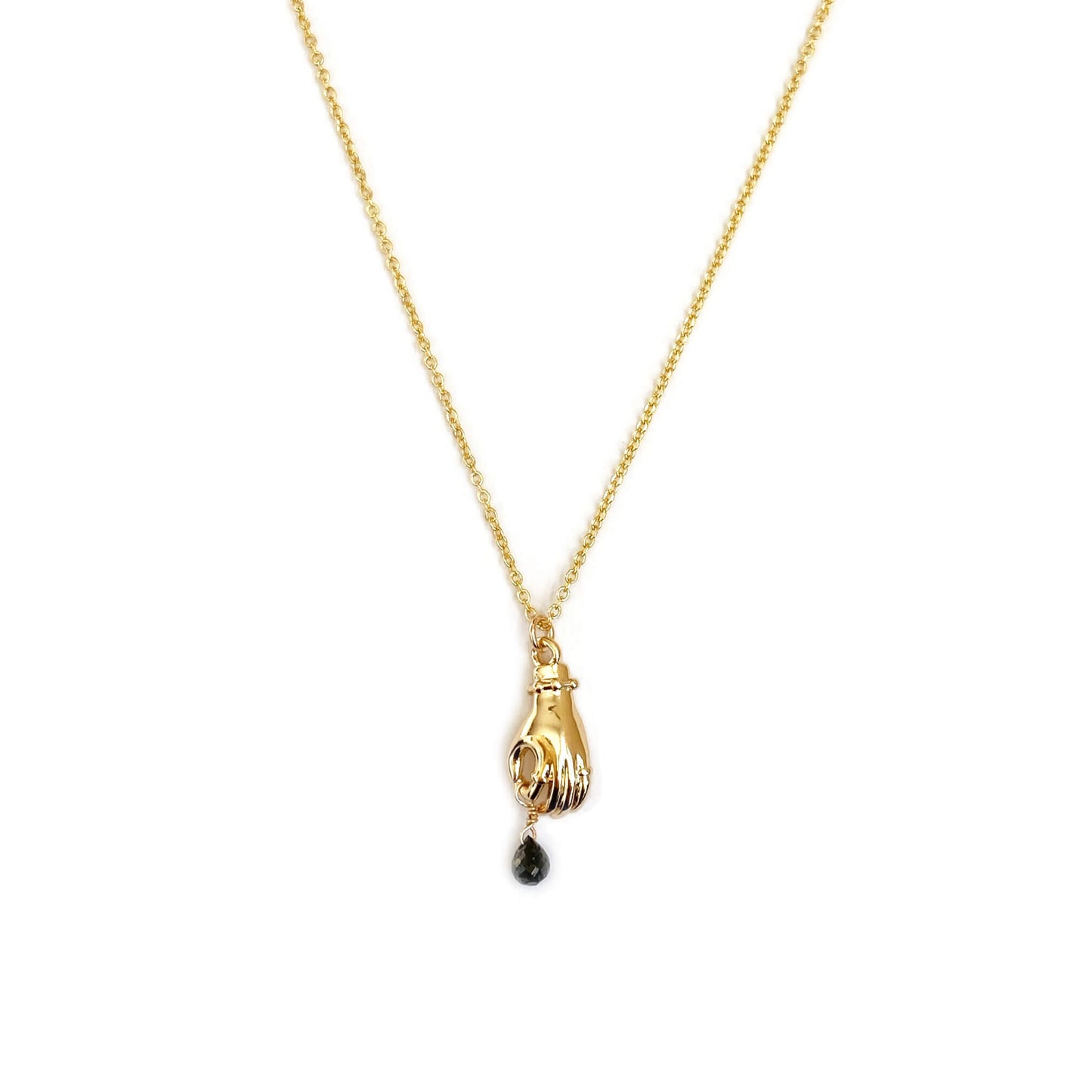 This is a receiving hand holding a dangling black diamond necklace. Made in gold filled chain.