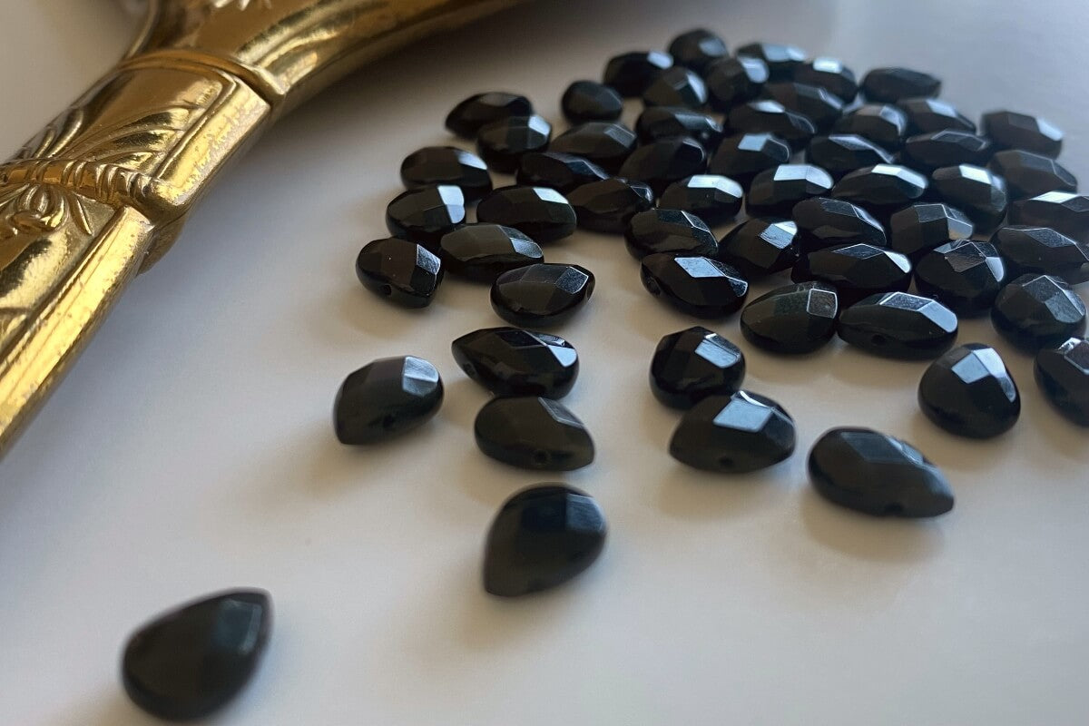 Black Obsidian beads that we use for our obsidian necklace.