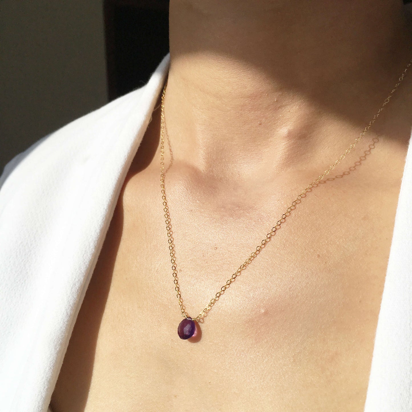 This amethyst necklace is adjustable. You can wear it at normal length or as a choker. This Amethyst crystal necklace can be made in 14k gold, sterling silver or gold filled chain.