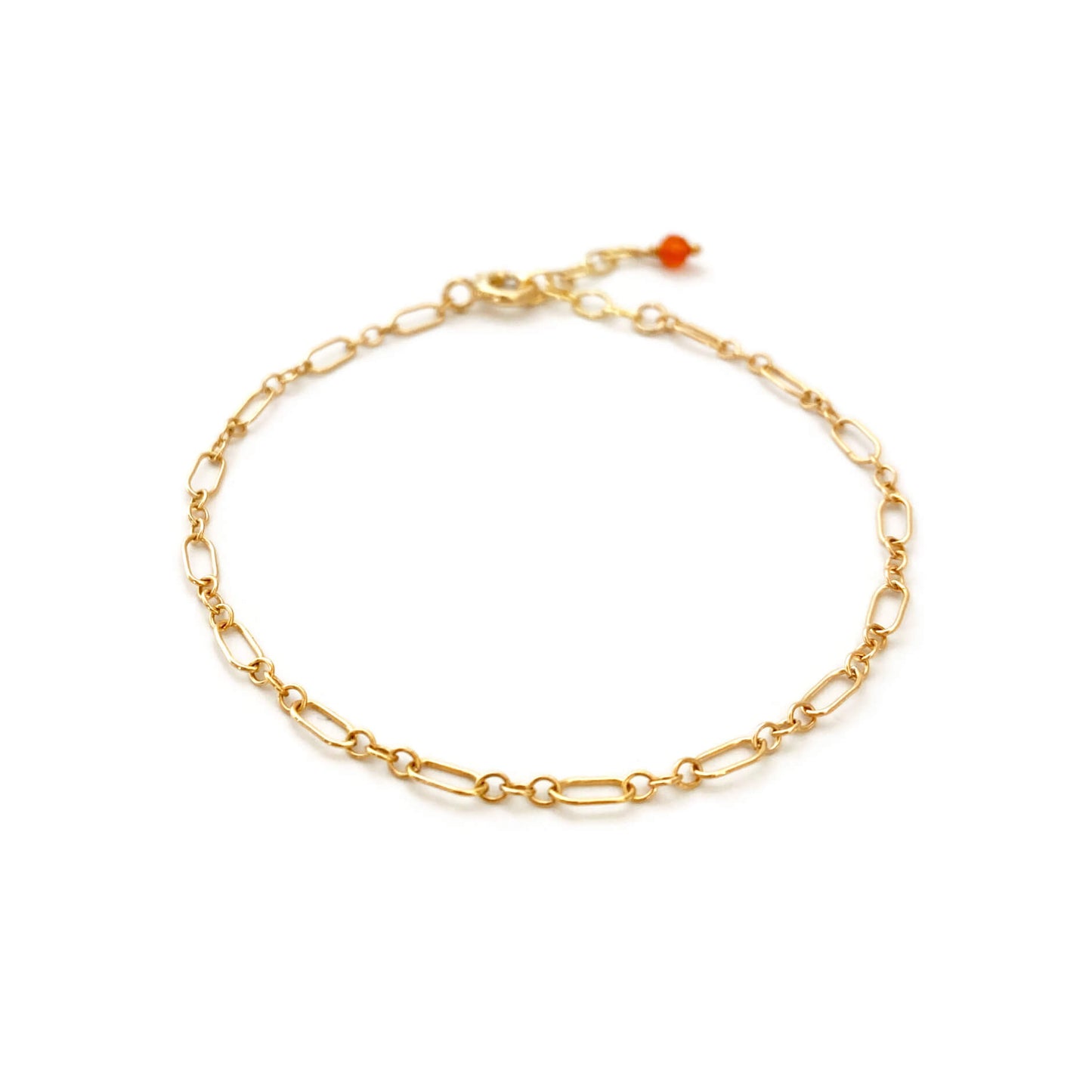 This is a dainty gold figaro chain with carnelian bead.  It's made of gold filled figaro chain with genuine carnelian bead.