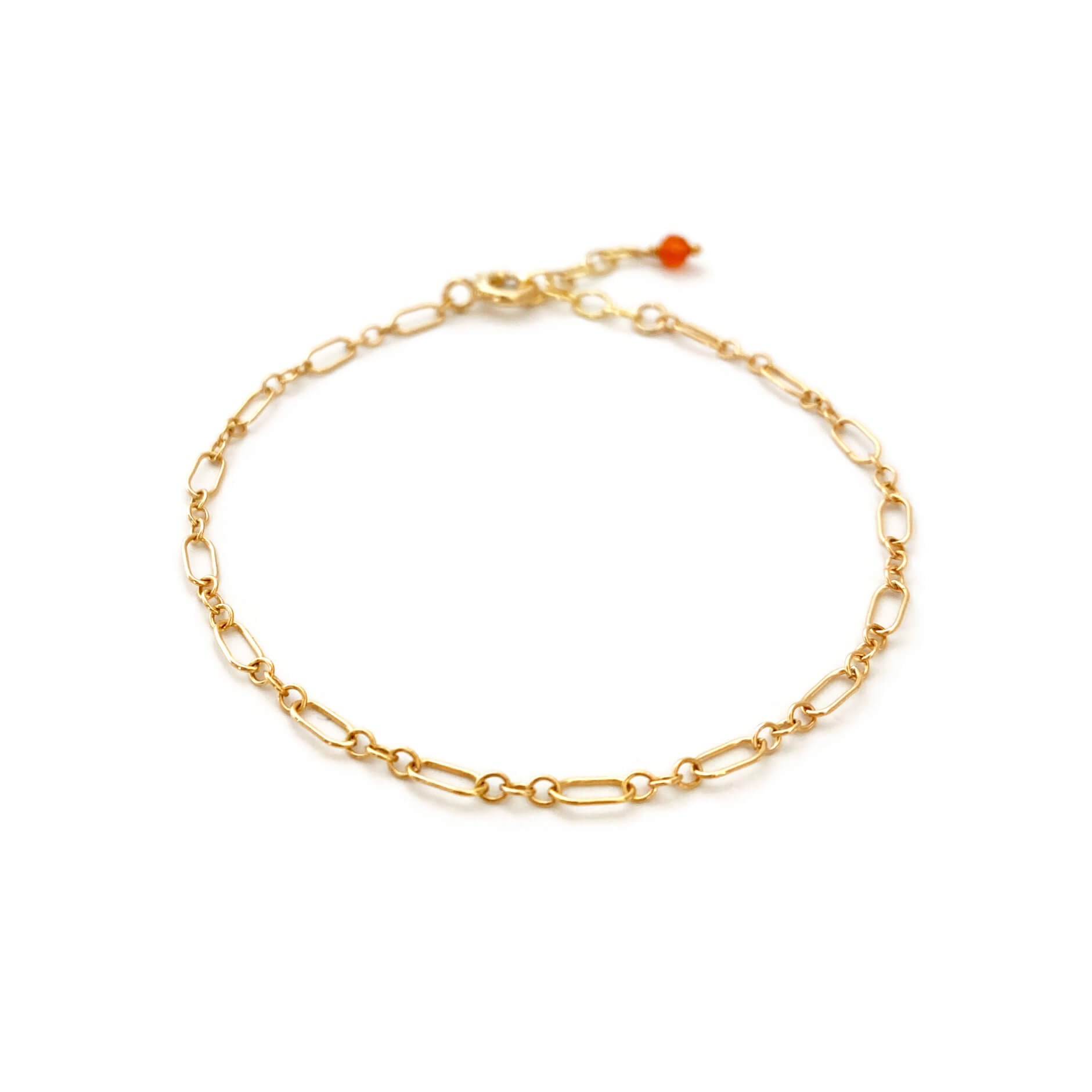 This is a dainty gold figaro chain with carnelian bead.  It's made of gold filled figaro chain with genuine carnelian bead.