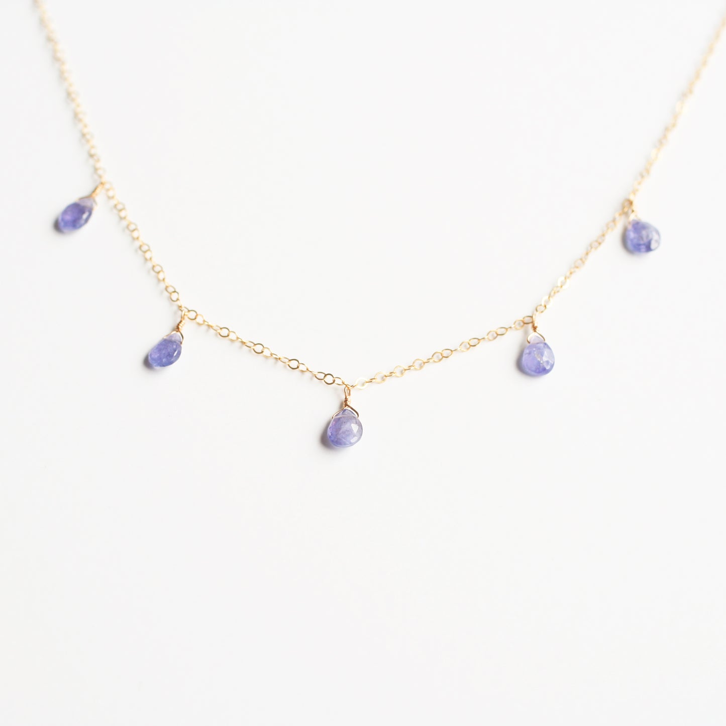 This Tanzanite necklace is made of real Tanzanite crystal and 14k gold chain.