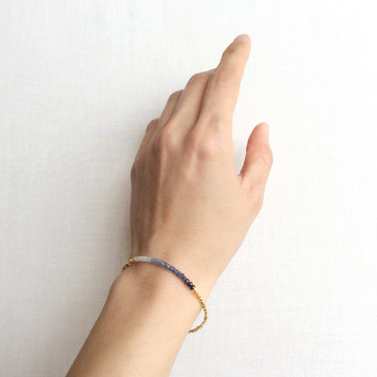 The beaded sapphire bracelet is made with hand-selected sapphires that have different shades of blue.