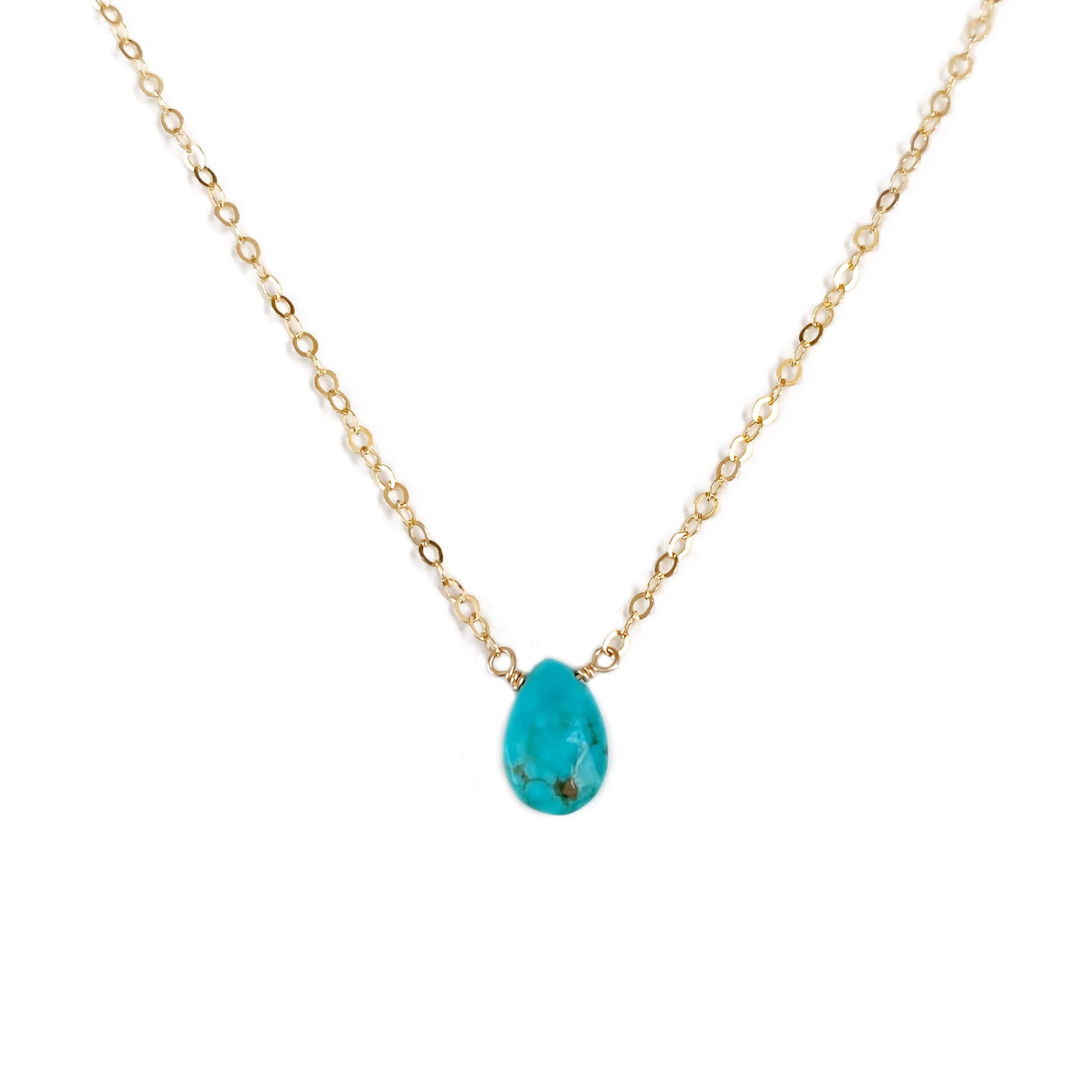 This dainty turquoise necklace is cute and simple.  It's made of a single real turquoise bead and 14k dainty gold chain.  The turquoise stone color is bright blue with some pyrite inclusion in it. Each gemstone is unique and no two are the same.