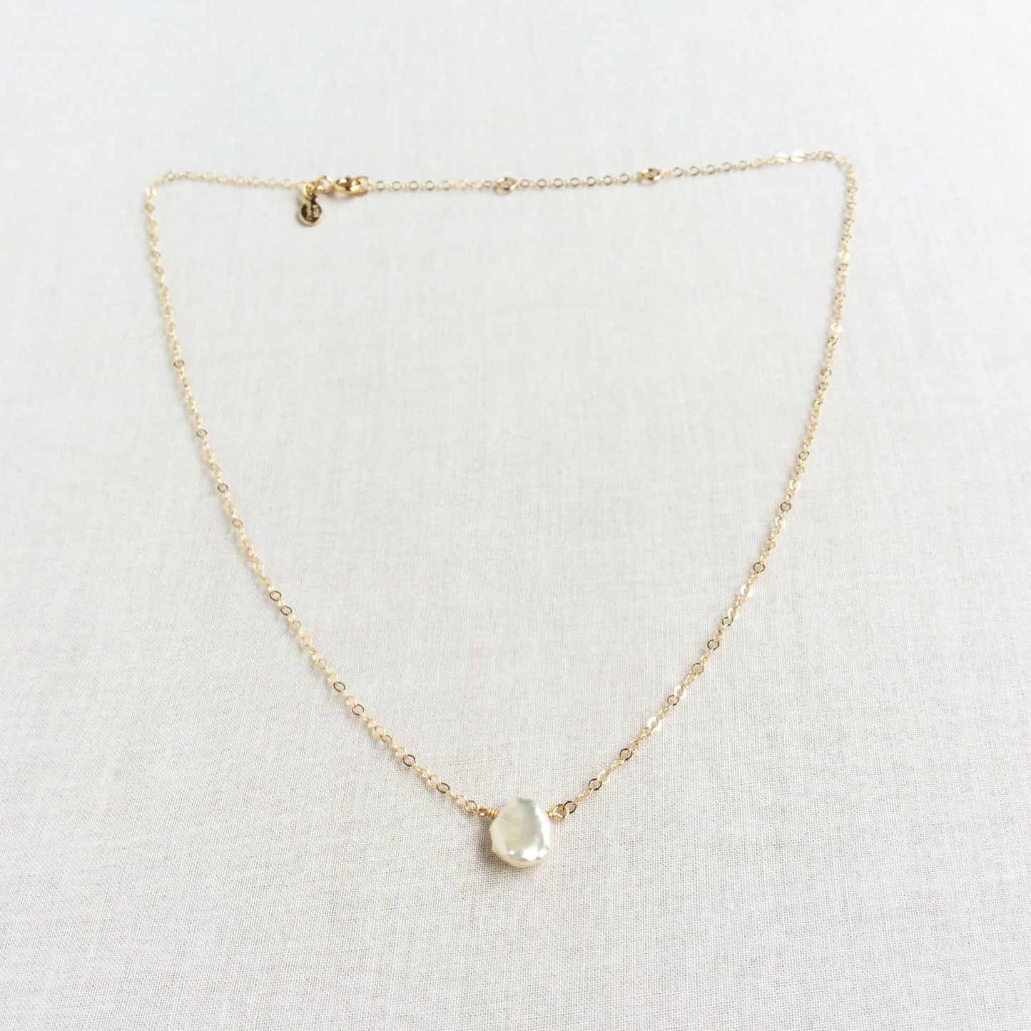 The keshi pearl necklace is unique because they do not grow in the ball shape that are more common in pearls.