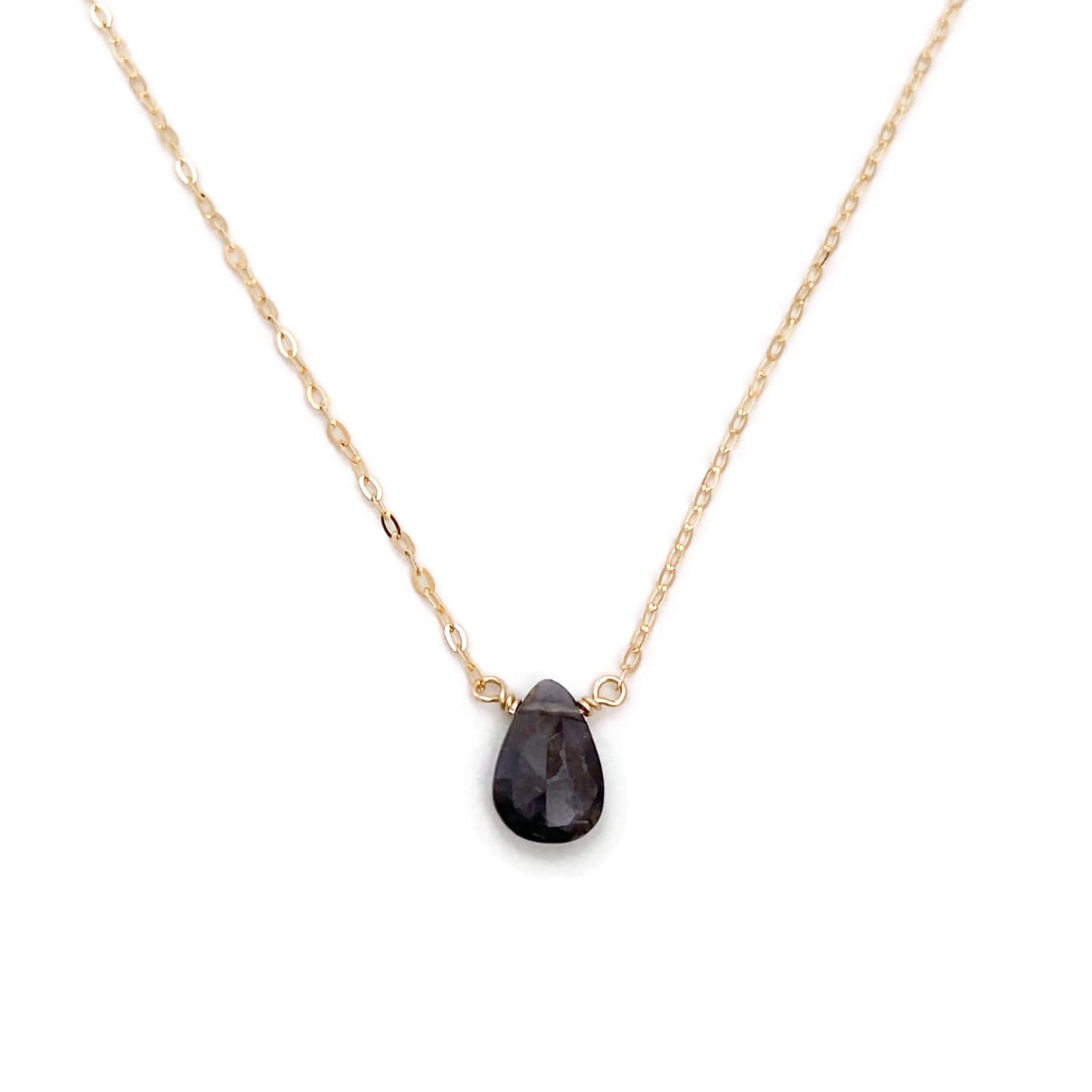 The iolite necklace is available in 14k gold, gold fill or sterling silver. This dainty purple necklace will help build strength to detoxify and help overcome bad habits.