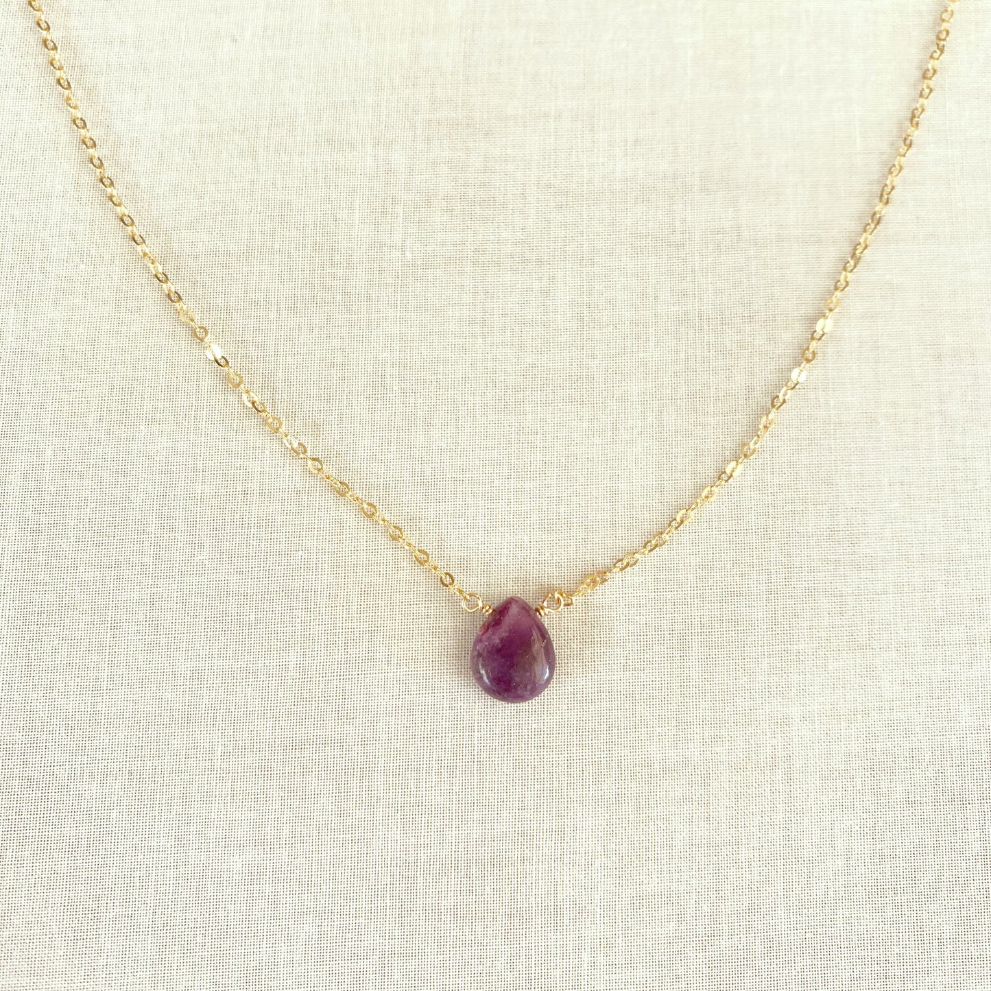 This Lepidolite necklace is made of genuine Lepidolite with gold chain. It look very similar to Amethyst but it's a totally different crystal.