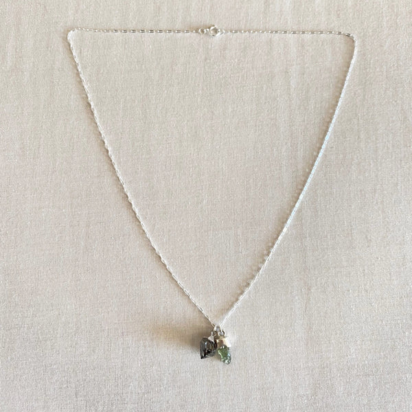 Moldavite and Herkimer diamond necklace is made of sterling silver. 