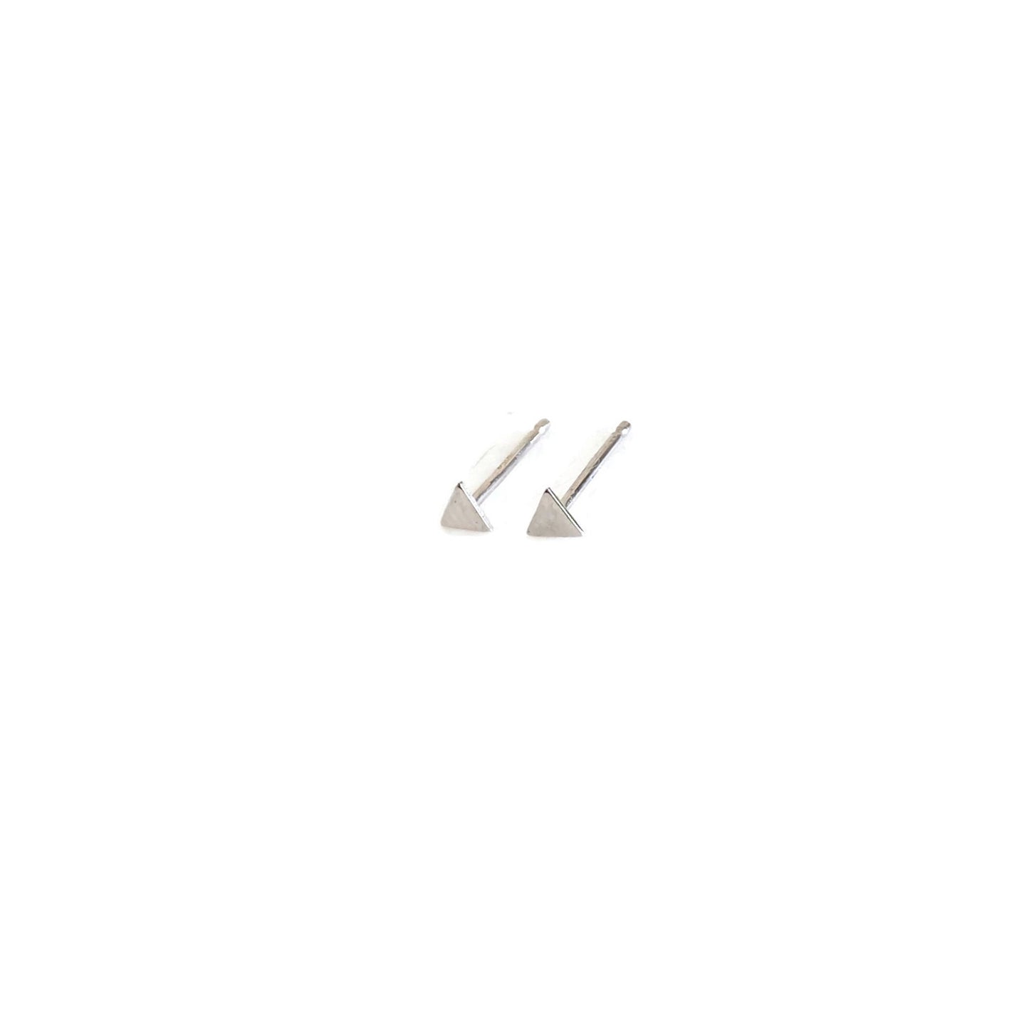 sterling silver tiny triangle studs are great for ear lobe or cartilage piercing.
