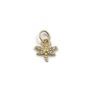 This is a dainty 14k solid gold dragonfly charm on a 3mm ring. 