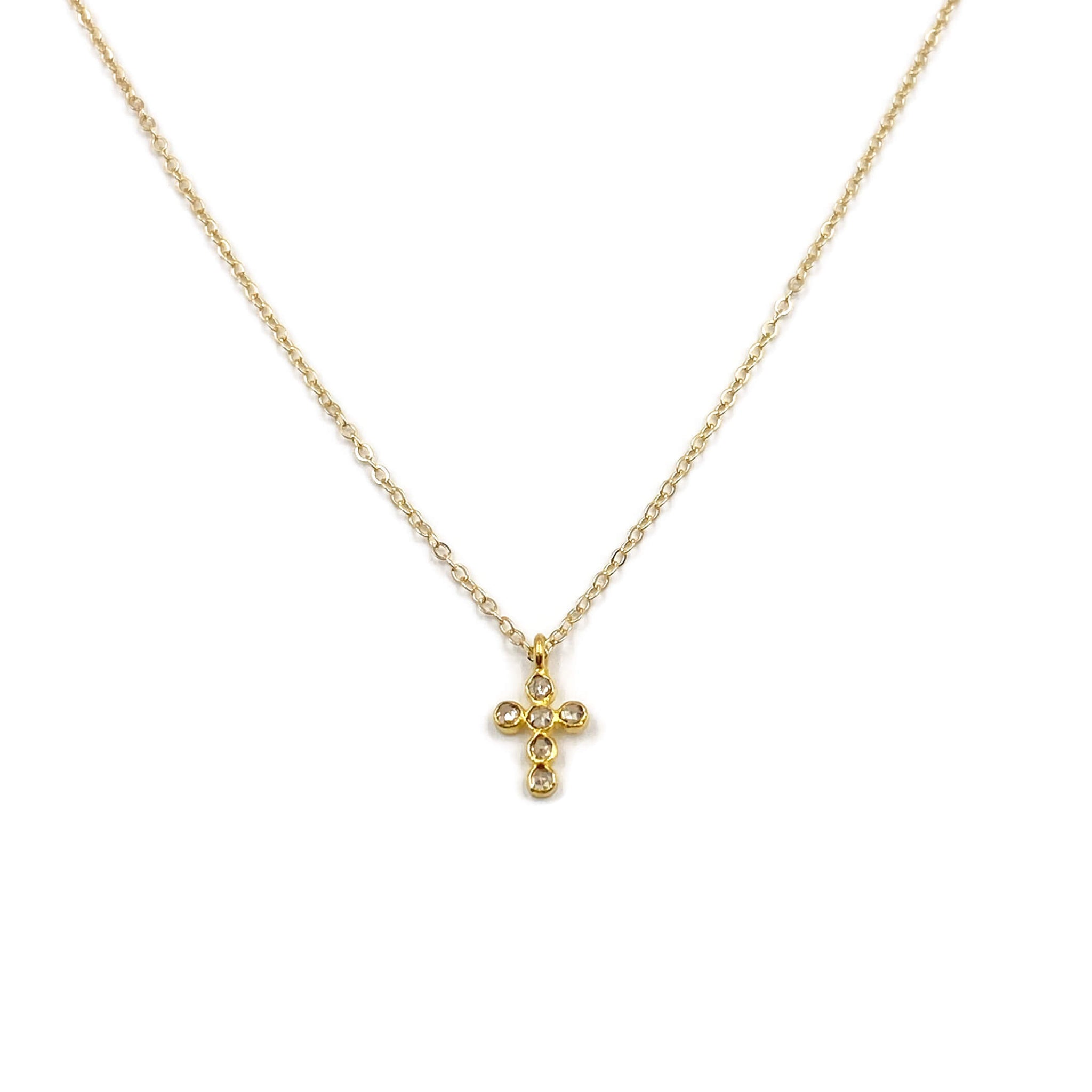 This is a diamond cross necklace that's made of 18k diamond cross and 14k solid gold chain.