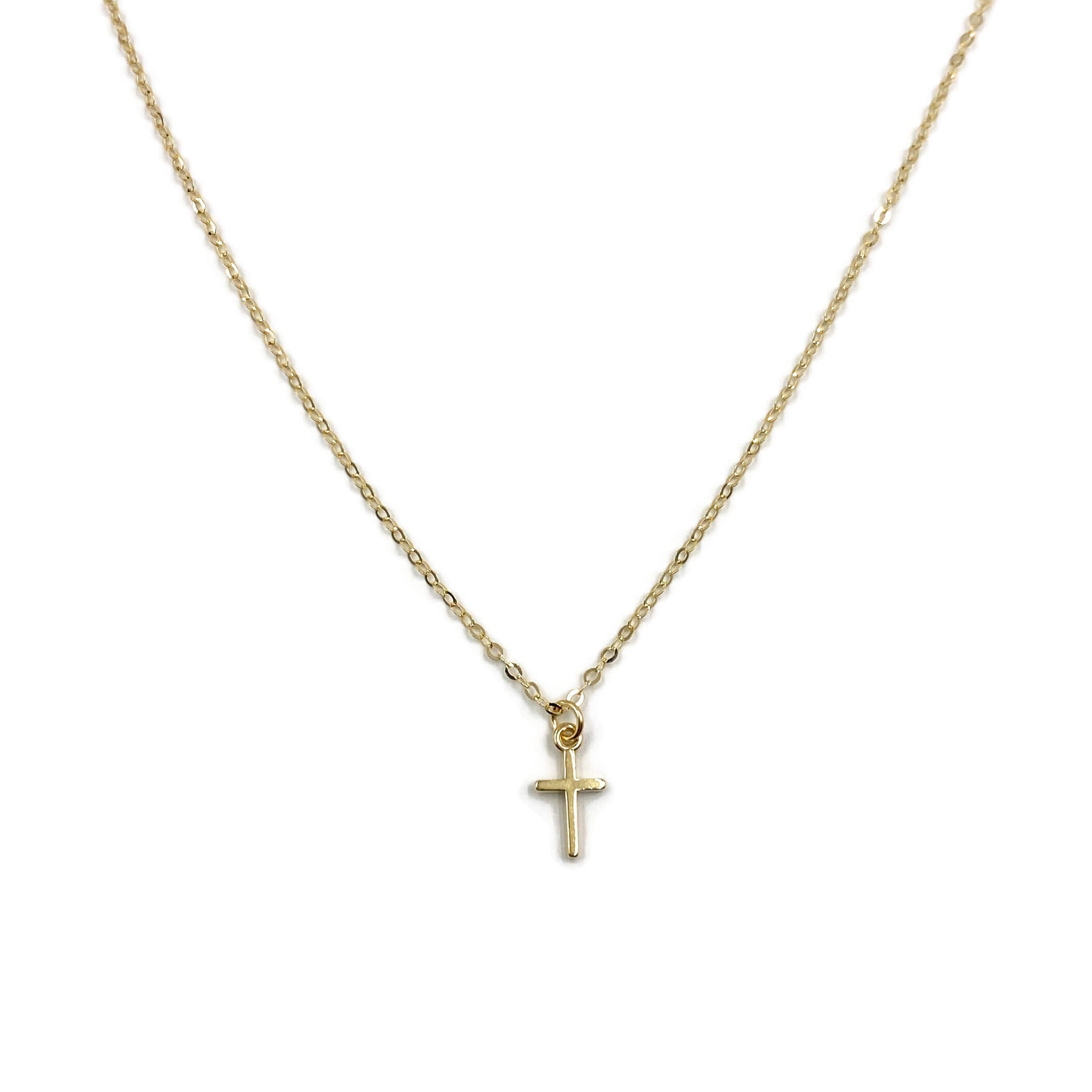 This is a 14k gold cross necklace that's made of 14k gold chain and 14k gold cross.