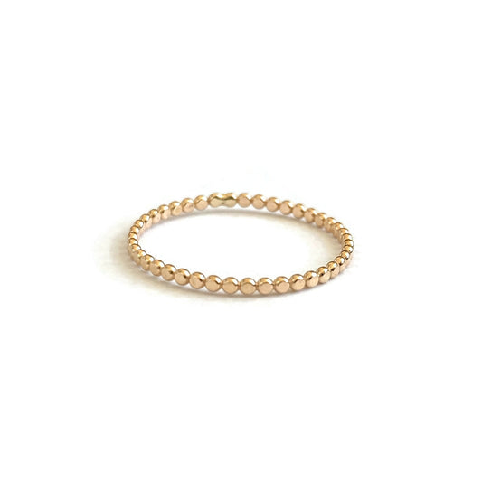 This is a 14k solid gold dot ring. It's available for size 4 to size 9. 