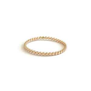 This is a 14k solid gold dot ring. It's available for size 4 to size 9. 