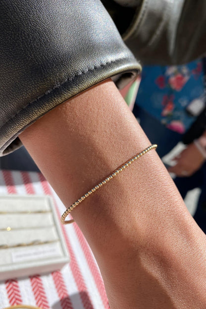 this is a 2mm gold filled bead bracelet that is stretchy 