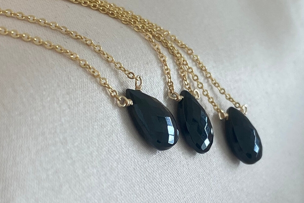 Three black tourmaline necklaces using high quality faceted genuine black tourmaline gemstones with dainty gold chain.