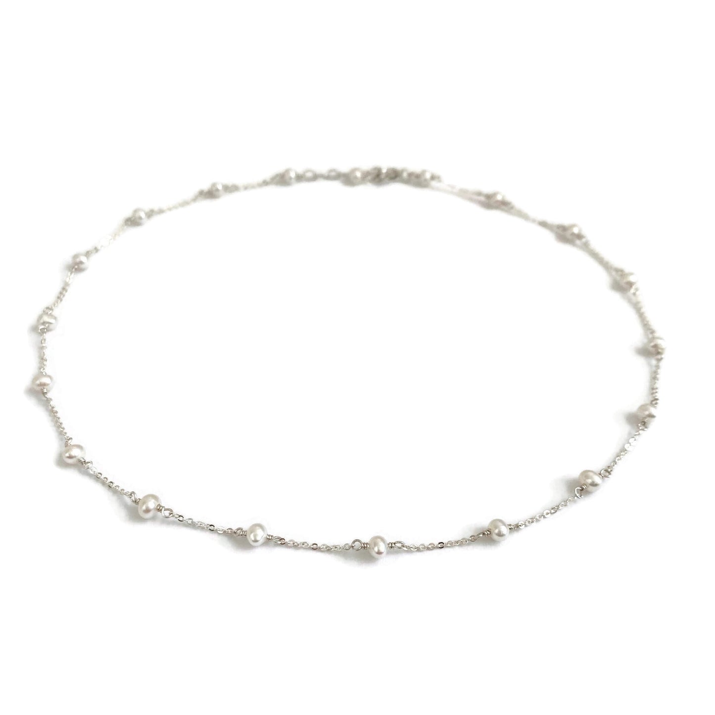 This pearl choker necklace is dainty and made of sterling silver chain with genuine fresh water pearl. 