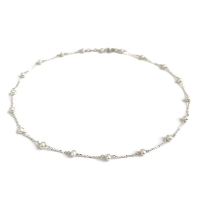 This pearl choker necklace is dainty and made of sterling silver chain with genuine fresh water pearl. 