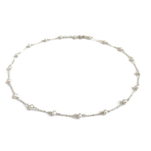 This pearl choker necklace is dainty and made of sterling silver chain with genuine fresh water pearl. 