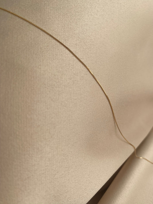 This is a 14k gold dainty box chain that is made of 14k solid gold. 
