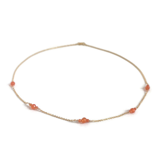 Necklace with carnelian beads on a thin gold chain