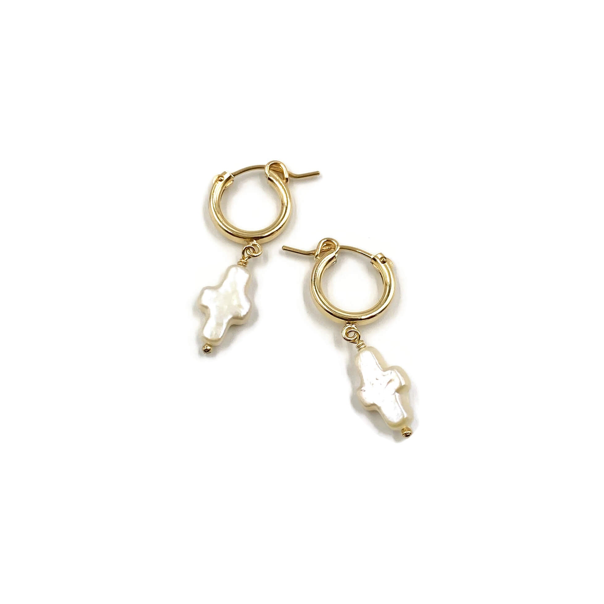 These are pearl cross hoop huggie earrings that can be made of gold filled or sterling silver.