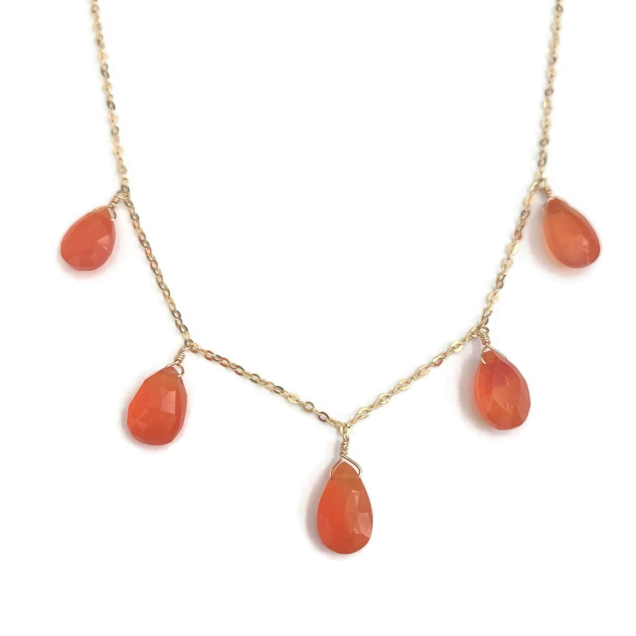 This is a carnelian necklace that is made of 5 pear shape carnelian drops. It can be made in 14k gold, gold filled or sterling silver chain. 