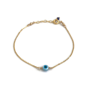 This is a gold evil eye bracelet that is made of gold filled chain with genuine evil eye. This bracelet is adjustable. 