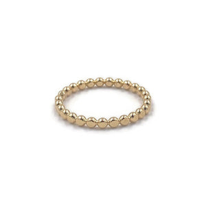 This is a gold hammer dot ring that is stackable.