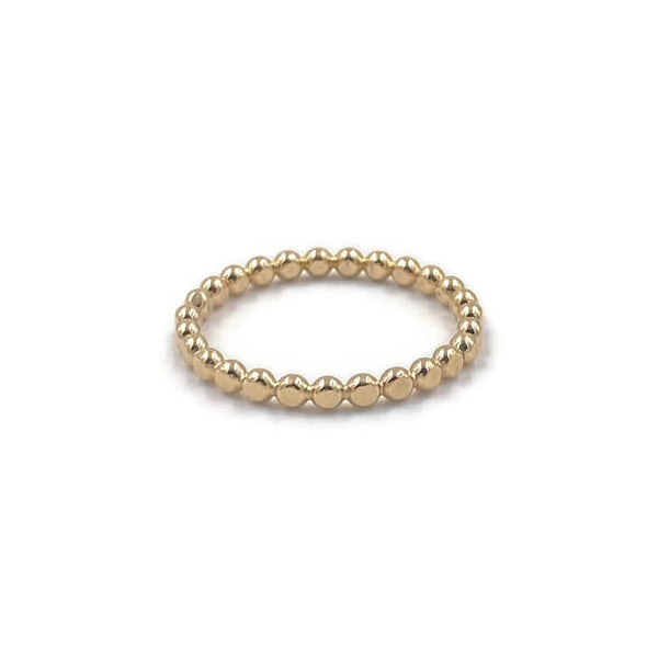 This is a gold hammer dot ring that is stackable.