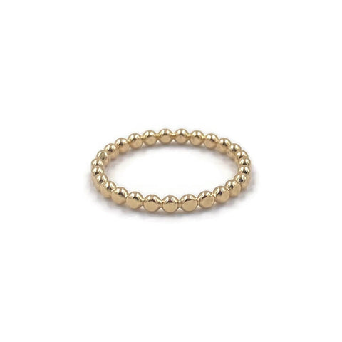 This is a gold hammer dot ring that is stackable.
