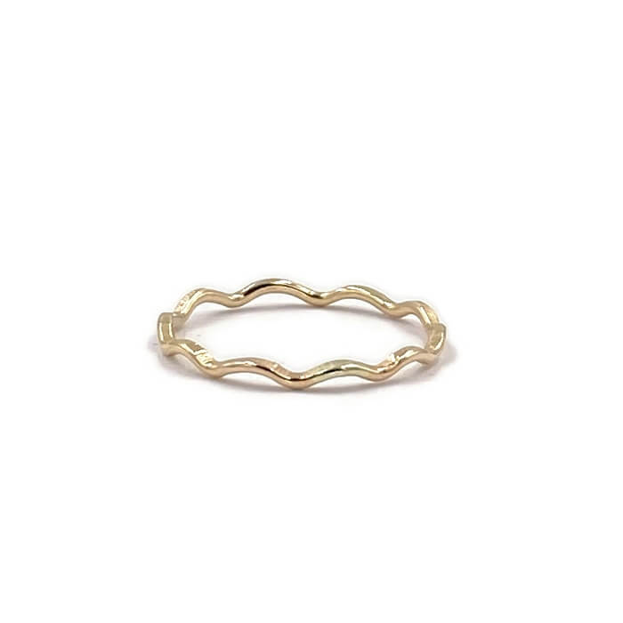 This is a dainty gold wave ring that is made of gold filled wire. 