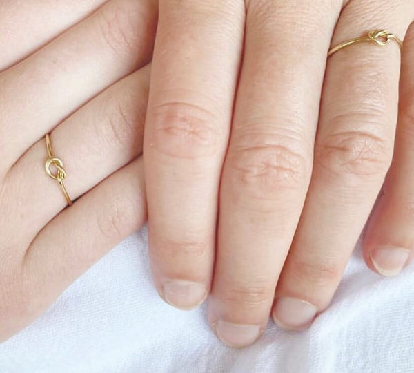 This love knot ring isn't just about romance; it's also a promise to always love and appreciate yourself.