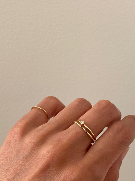 There are 3 dainty gold filled ring including dainty solitaire gold filled ring, gold filled twist ring and gold filled pinky ring.