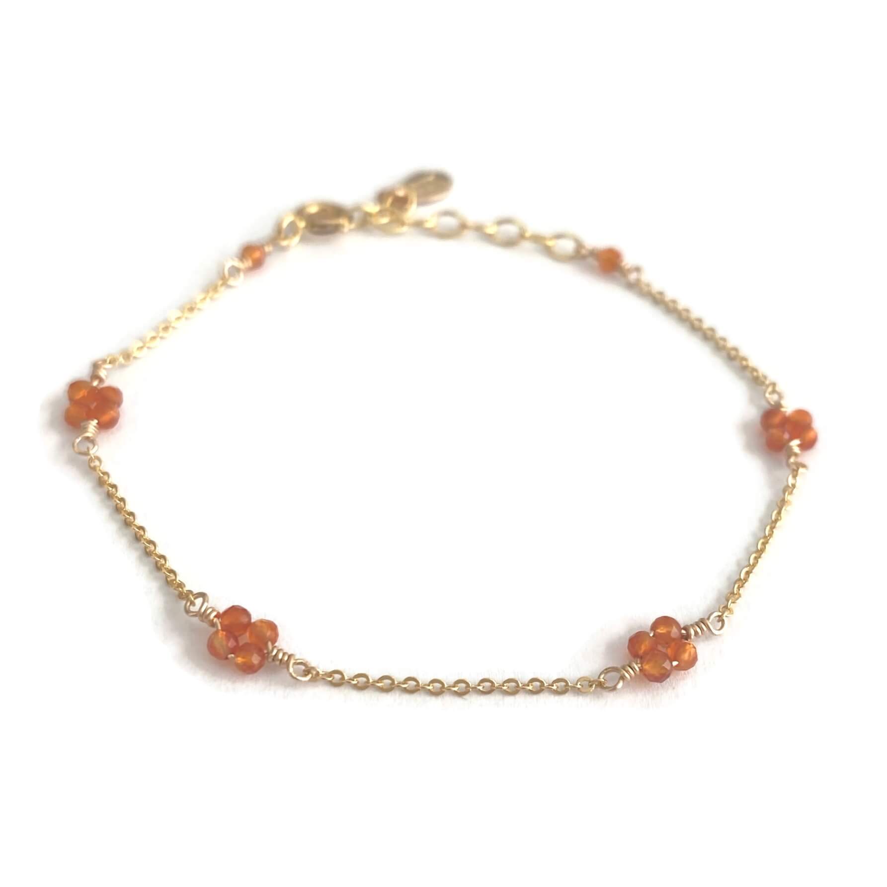 This is a flower beads bracelet that is made of genuine Carnelian beads and gold filled chain. 