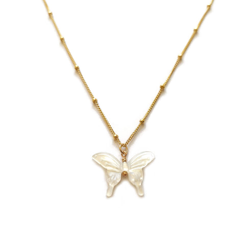 This is a white butterfly necklace that's made of MOP butterfly charm and 14k gold chain. 