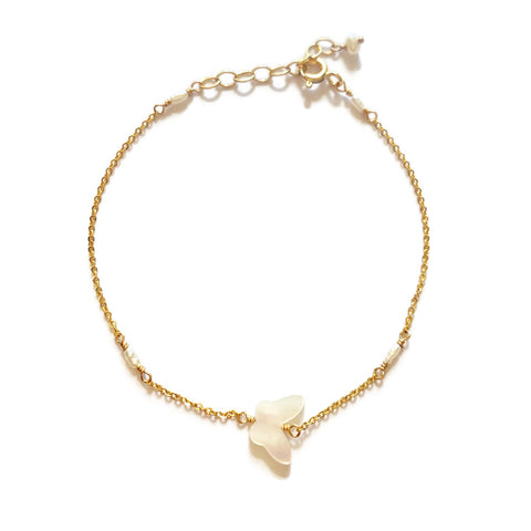 This is a white butterfly bracelet that's made of 14k gold chain, fresh water pearl and MOP butterfly charm. 