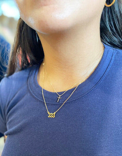 This is a 333 necklace that's 18" long and made of gold filled 333 charm and gold filled chain.