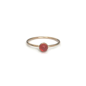 This is a dainty Carnelian Ring that is made of genuine Carnelian crystal and gold filled material. 