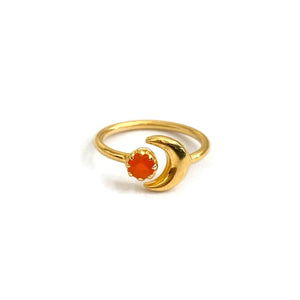This is a carnelian moon ring that's made of sterling silver plated with thick layer of gold