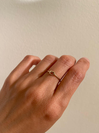 This is a gold love knot ring that is made of 1mm gold filled wire
