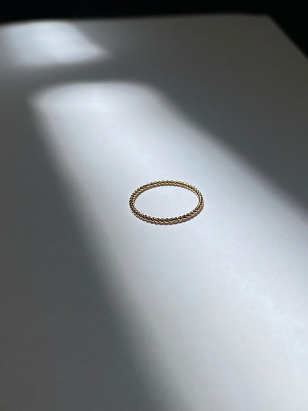 This is a gold filled twist ring in the sunlight that you can see the texture in detail