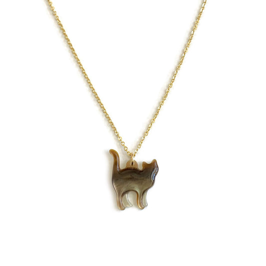 This black cat necklace is made of genuine black mother of pearl on a gold chain. 