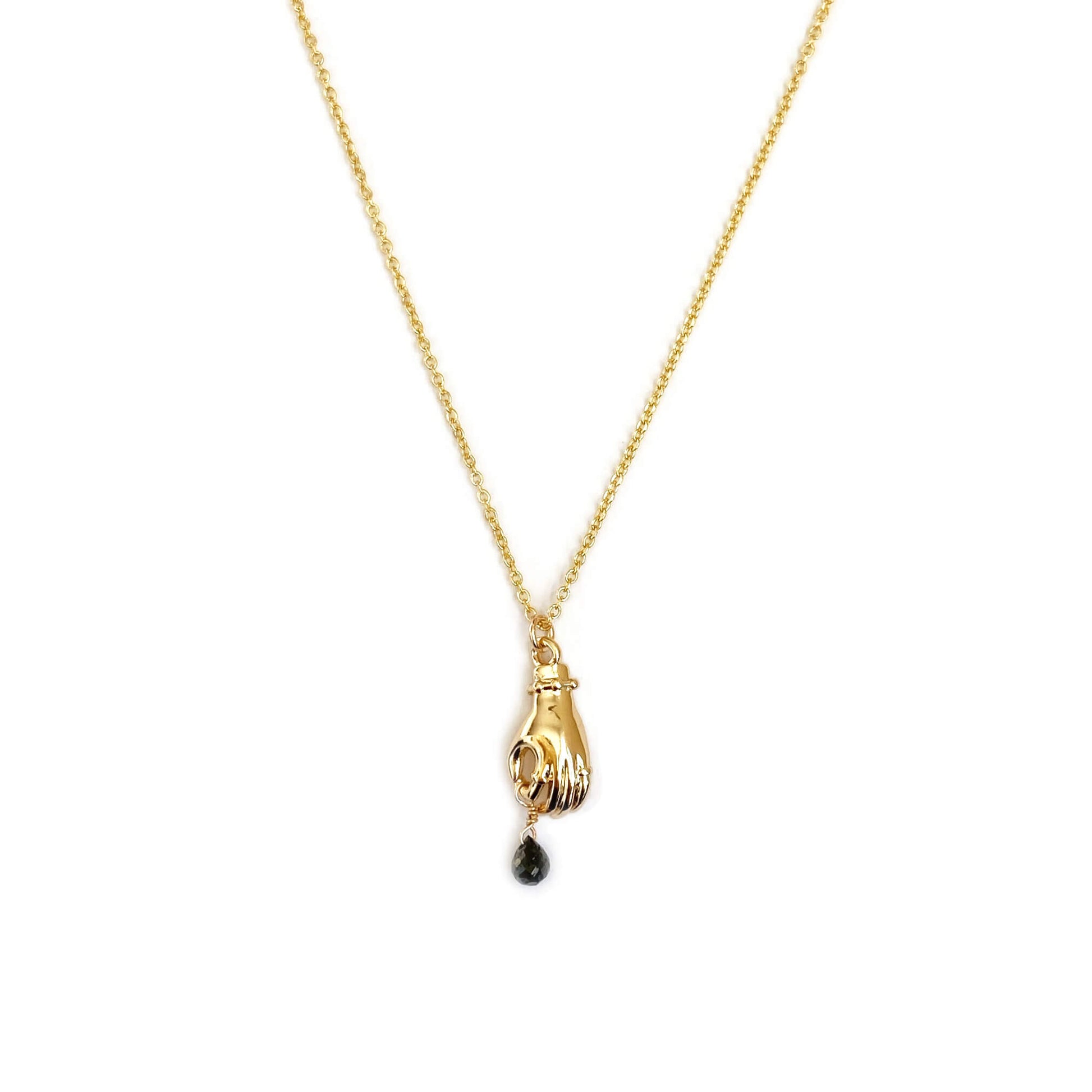 This is a receiving hand holding a dangling black diamond necklace. Made in gold filled chain. 