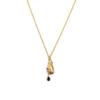 This is a receiving hand holding a dangling black diamond necklace. Made in gold filled chain. 