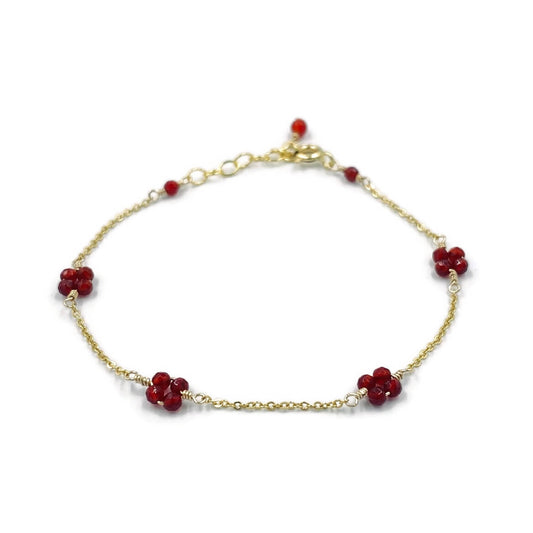 Gold bracelet with genuine carnelian beads in flower pattern 
