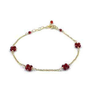 Gold bracelet with genuine carnelian beads in flower pattern 